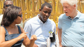 Regine Simon Barjon, Martenot Neils Narcius , and Former President and UN Special Envoy to Haiti Bill Clinton