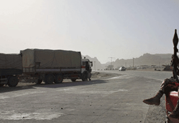 A convoy containing military hardware heads west to a Coalition outpost in northern Helmand province on June 17, 2006, in Kandahar, Afghanistan. (Photo by John Moore/Getty Images)