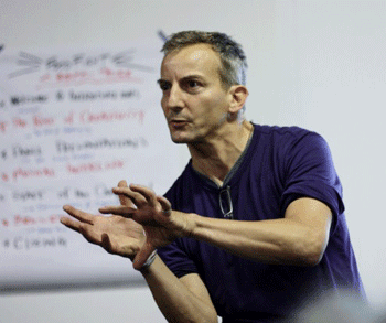 Andrew Boyd, co-editor of Beautiful Trouble, talks to audience members about using art to keep methods of direct action fresh and captivating to the public. (Dan Bluemel / LA Activist)