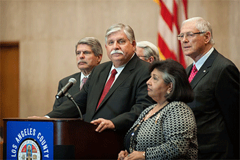 New sheriff-designate John Scott meets the media with the Board of Supervisors at his side. (Photo: ZevWeb)