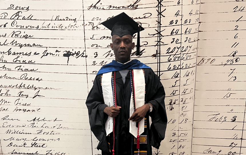 Lusene Donzo on graduation day. He holds a bachelor's Degree in Computer Science as well as a Master's Degree