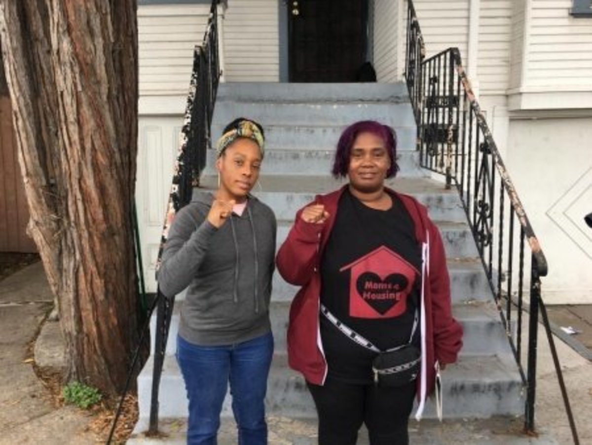 Moms 4 Housing co-founders Dominique Walker, left, and Sharena Thomas in West Oakland. (Ariel Boone)