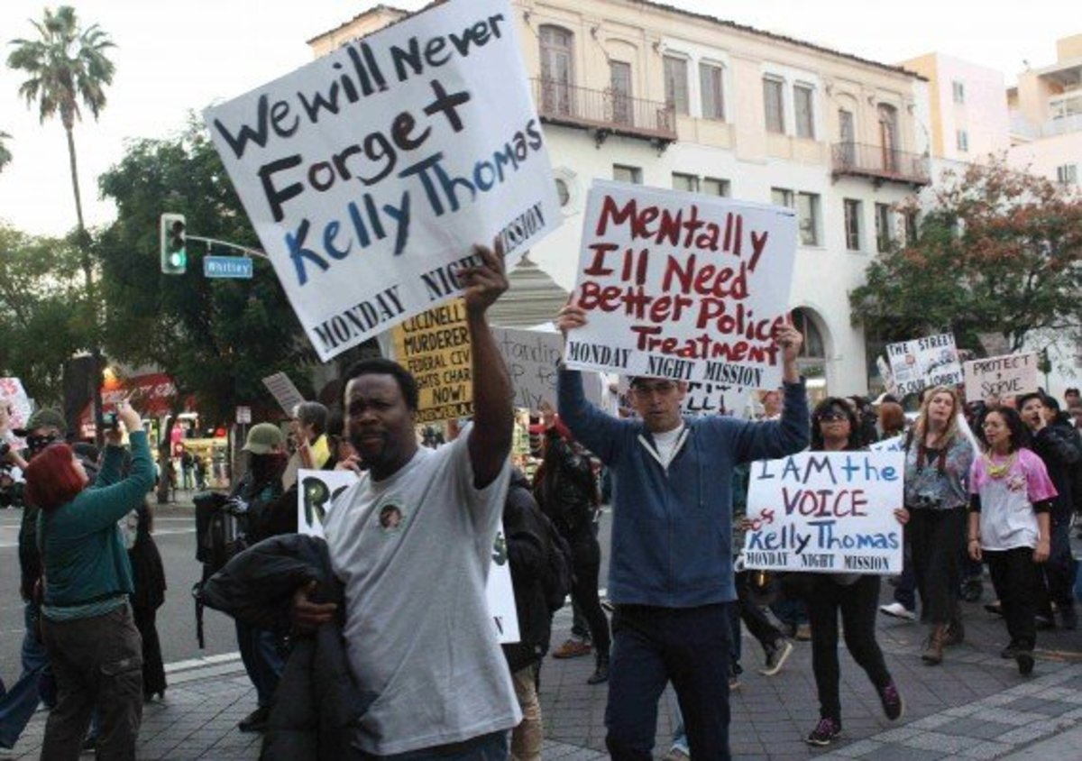 Demonstrators march in Hollywood on Feb.8 to demand justice for Kelly Thomas, a mentally-ill homeless man who was brutally beaten by Fullerton police. Thomas died five days later and the officers responsible for the beating were acquitted of second-degree murder and lesser charges