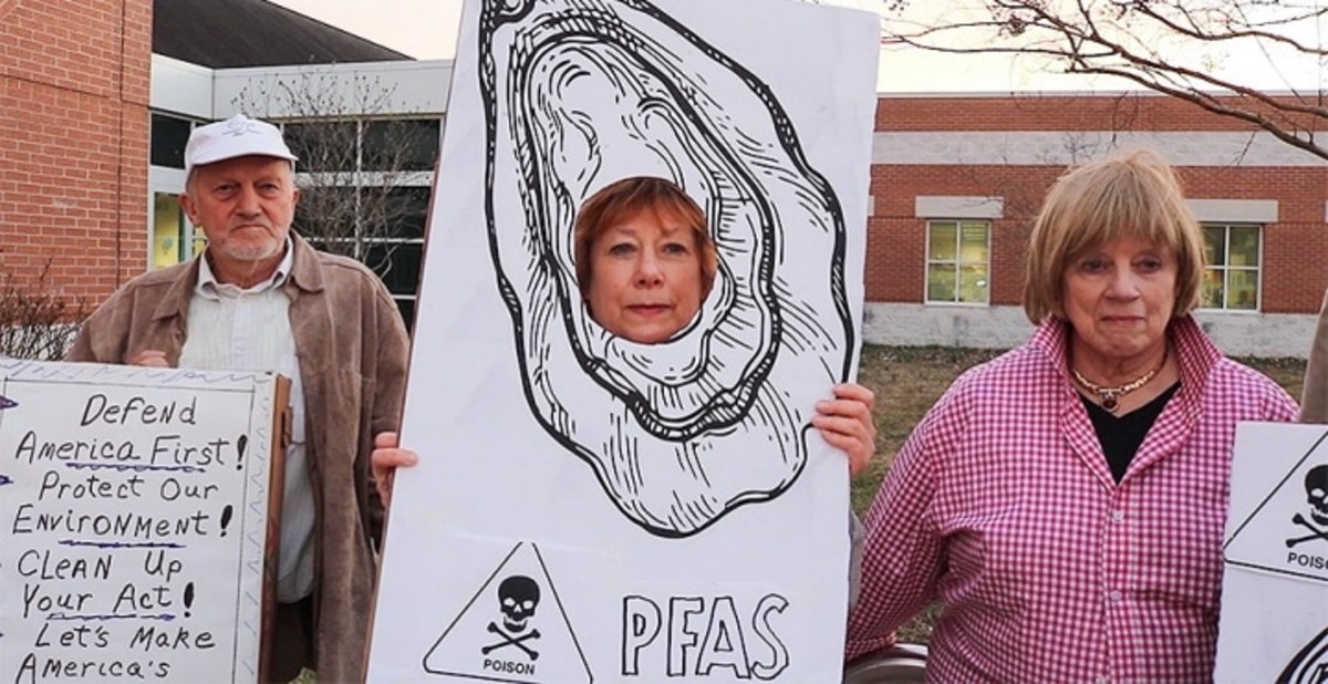 Environmental activists greeted 300 concerned citizens as they entered the Lexington Park                      Library to hear a Navy presentation on PFAS contamination on March 3, 2020.