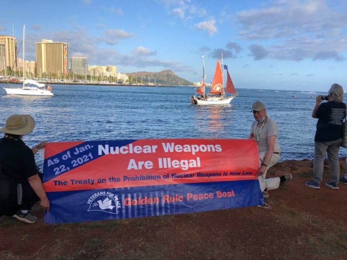 The Golden Rule sails by her farewell gathering on Magic Island, Honolulu, May 1, 2021 (Photo: Ann Wright)