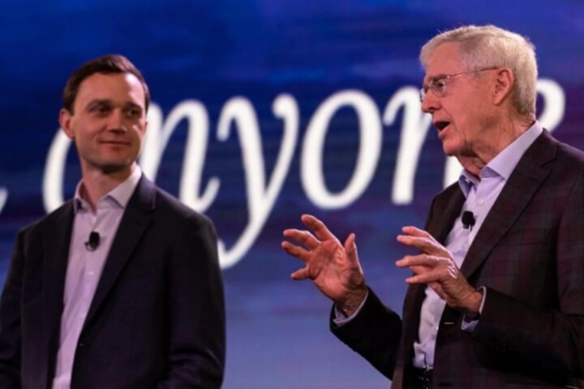 Brian Hooks, chairman of the Koch network, and Charles Koch, its main patron, speak to donors Saturday night during the Koch network seminar in Indian Wells, Calif. (Seminar Network)