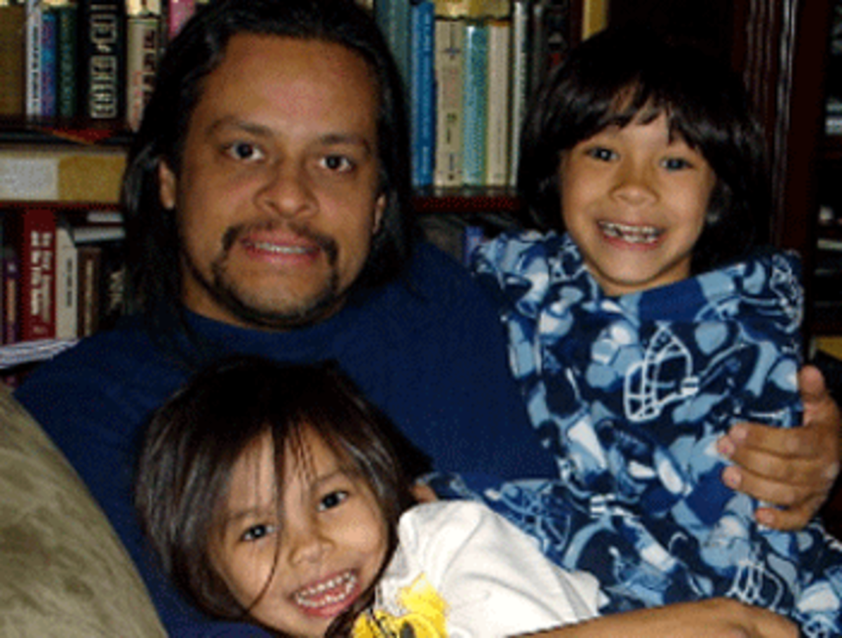 Fernando Orozco, with his two youngest, Jade and Julius.