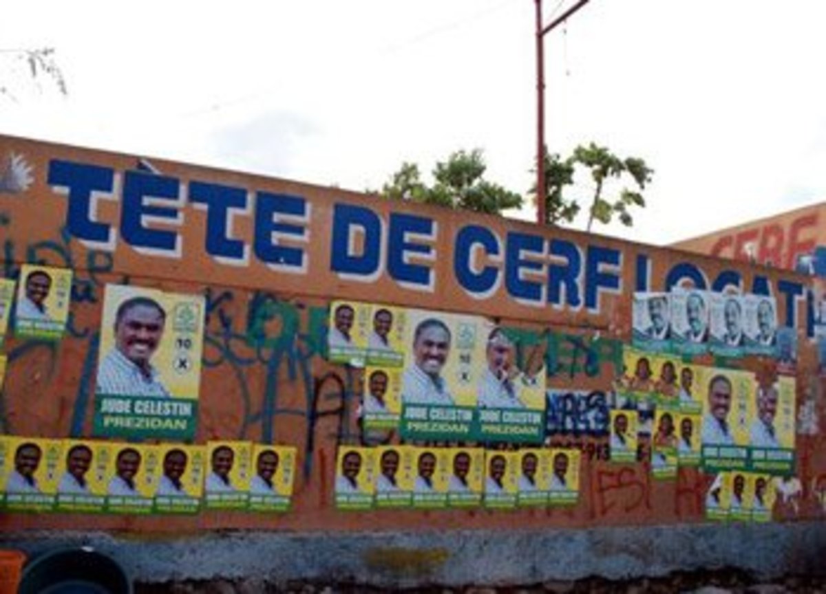 Posters for the Government's choice plastered all over Haiti Copyright G. Nienaber