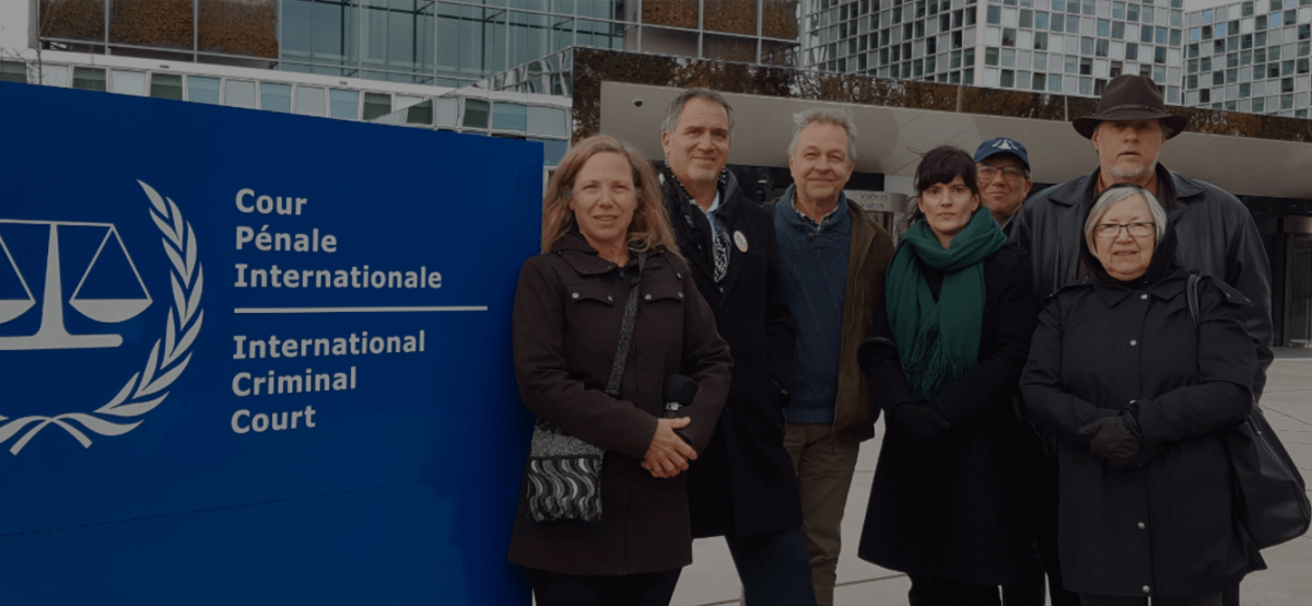 Delegation at the International Criminal Court in the Hague, Netherlands on November 19, 2018. From left to right Margaret Flowers, Green Party co-chair, member of the Green Party Peace Action Committee and Green Party of Maryland, Miko Peled, Green Party US member, Dirk Adriaensens of the BRussells Tribunal, Diane Moxley of Green Party International Committee and Green Party of New Jersey, Stephen Verchinski of the Green Party International Committee and Green Party of New Mexico, Marie Spike, of the Green Party International Committee and Green Party of Michigan and Kevin Zeese of the Green Party Peace Action Committee and Green Party of Maryland
