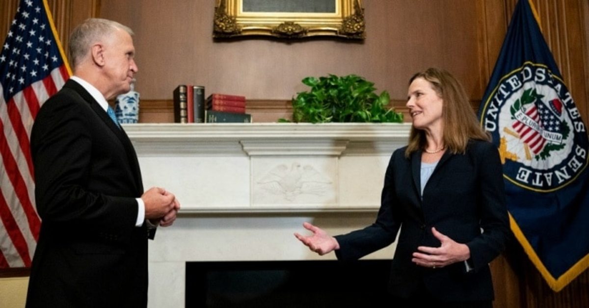Seventh U.S. Circuit Court Judge Amy Coney Barrett, President Trump's pick for the Supreme Court, meets with Sen. Thom Tillis (R-NC) in the Mansfield Room of the U.S. Capitol on September 30, 2020 in Washington, D.C. Tillis announced he had tested positive for Covid-19 on Friday. (Photo: Bill Clark-Pool/Getty Images)