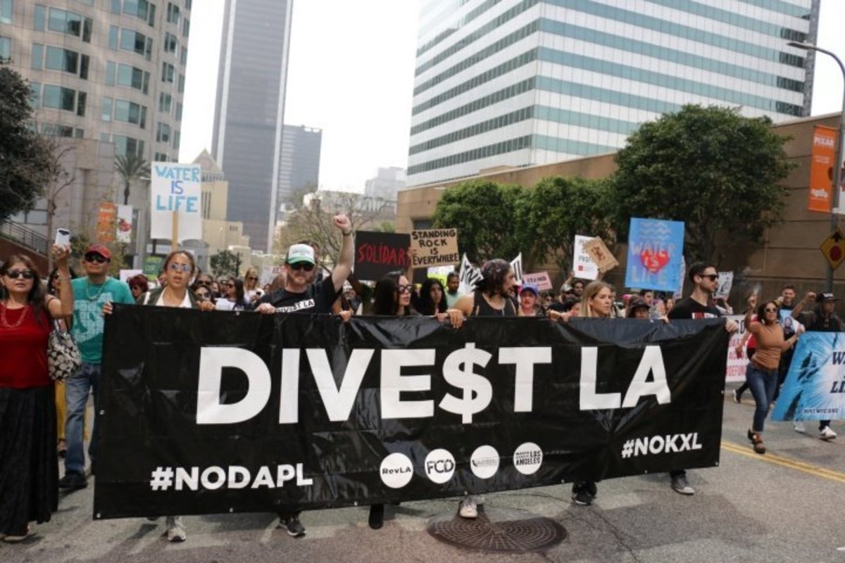 Divest LA activists march through downtown Los Angeles in solidarity with Standing Rock