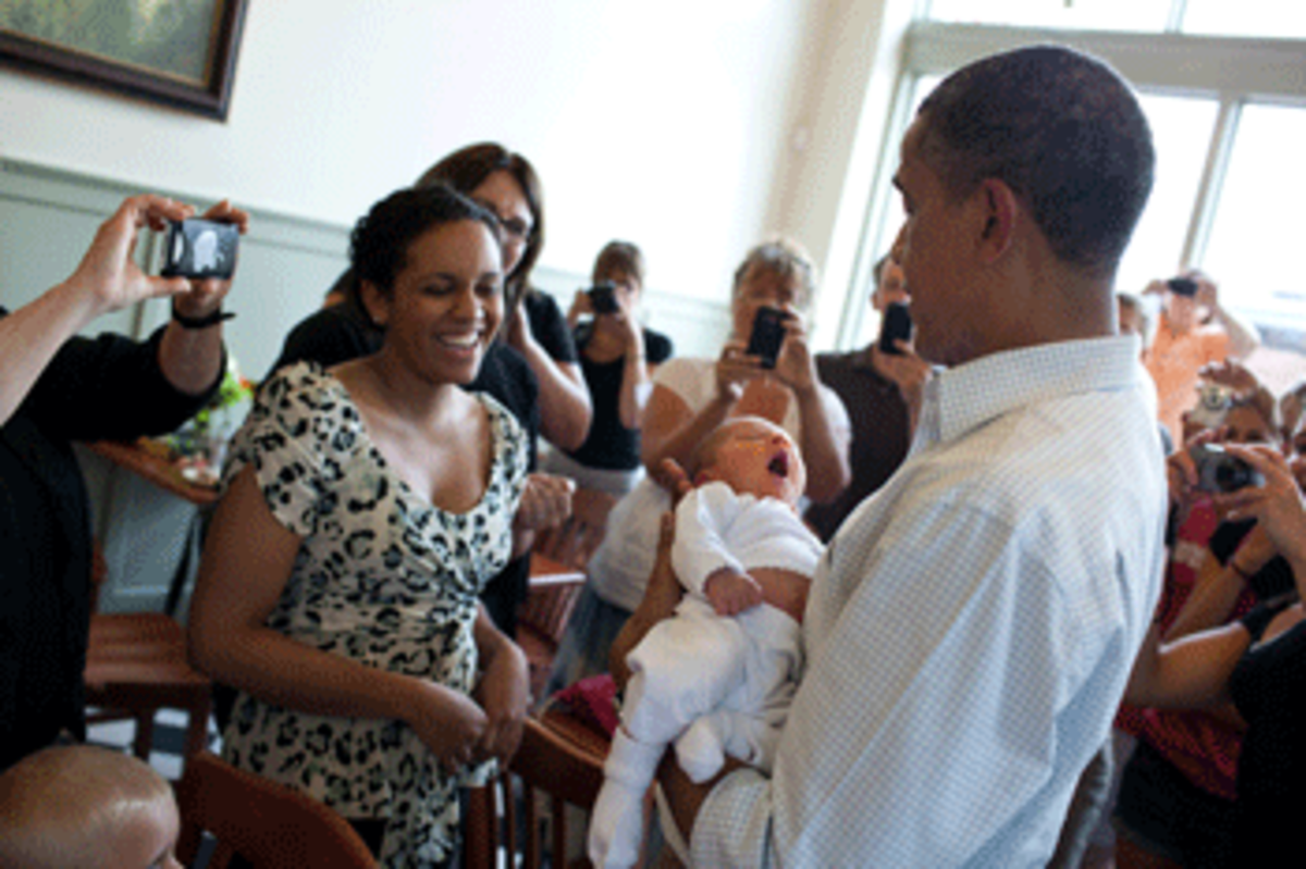 obama hugging baby