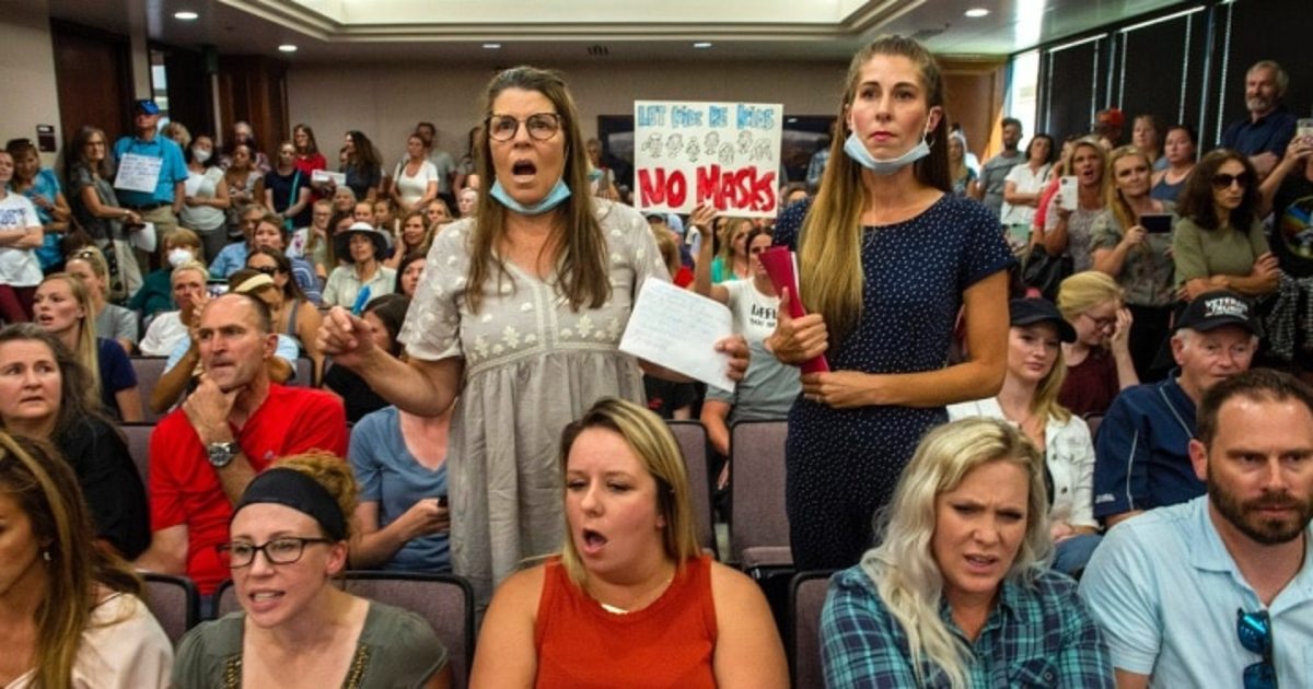 Angry residents react when the Utah County Commission meeting was adjourned before it even started. (Photo: Rick Egan)