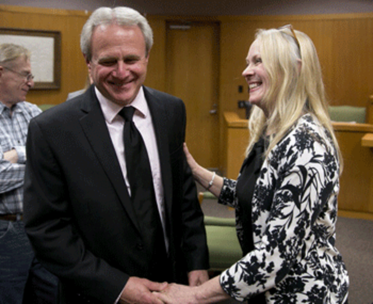 Michael Morton and wife Cynthia smile in Georgetown courtroom after Ken Anderson sentencing on November 8th