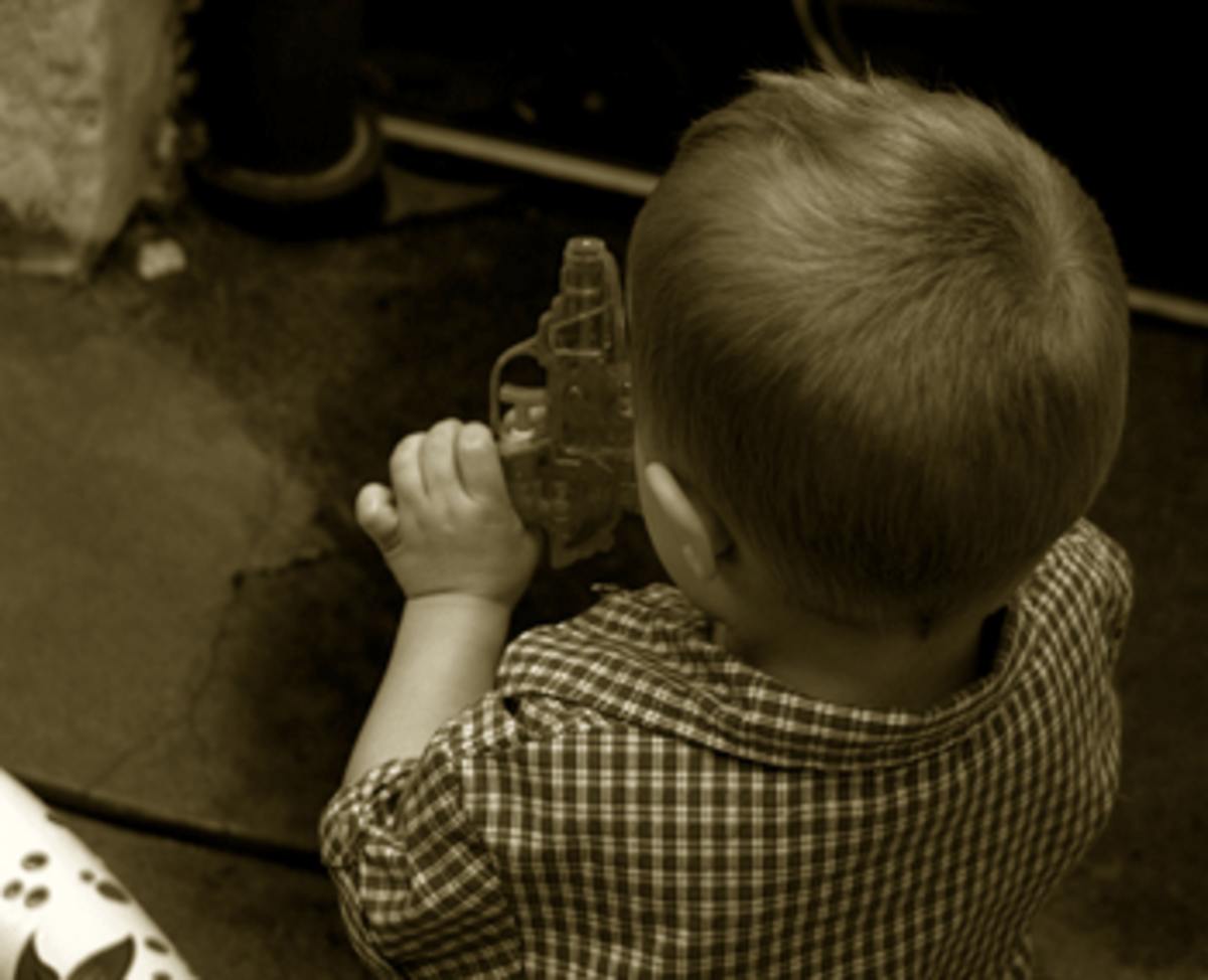 child with gun