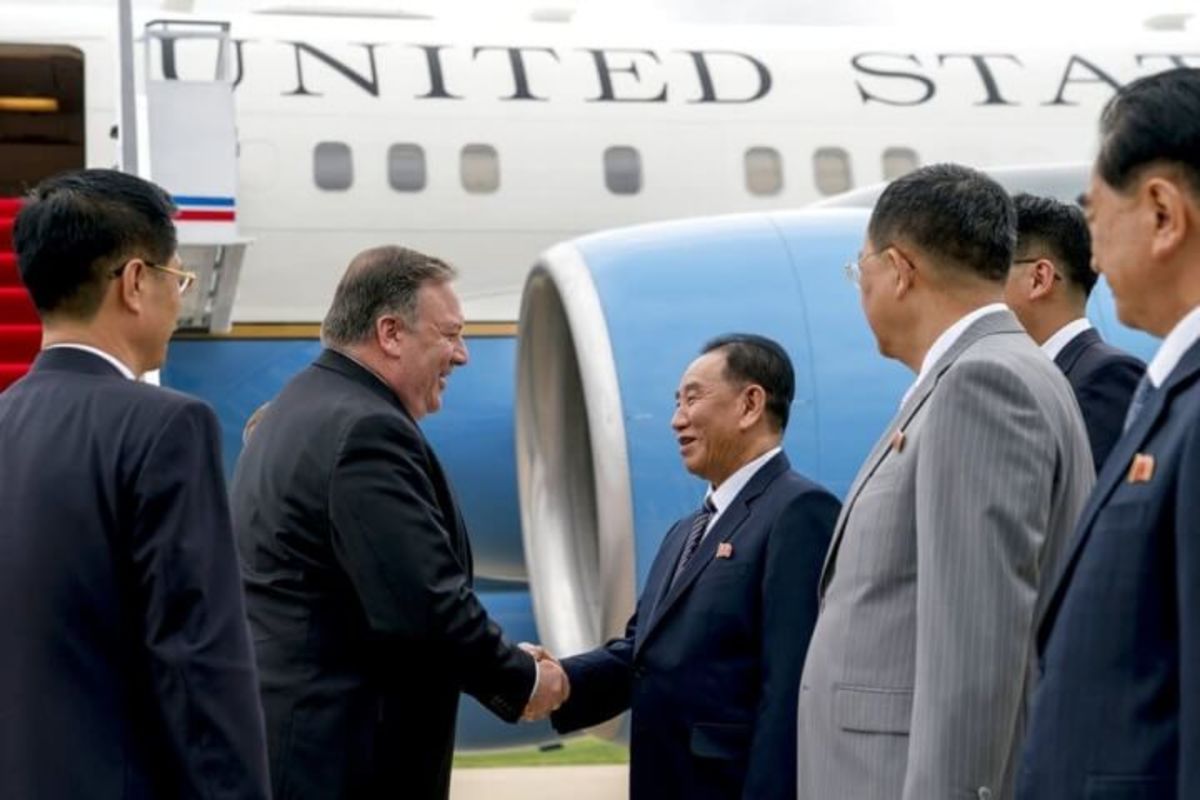 Secretary of State Mike Pompeo greets North Korean Director of the United Front Department Kim Yong Chol