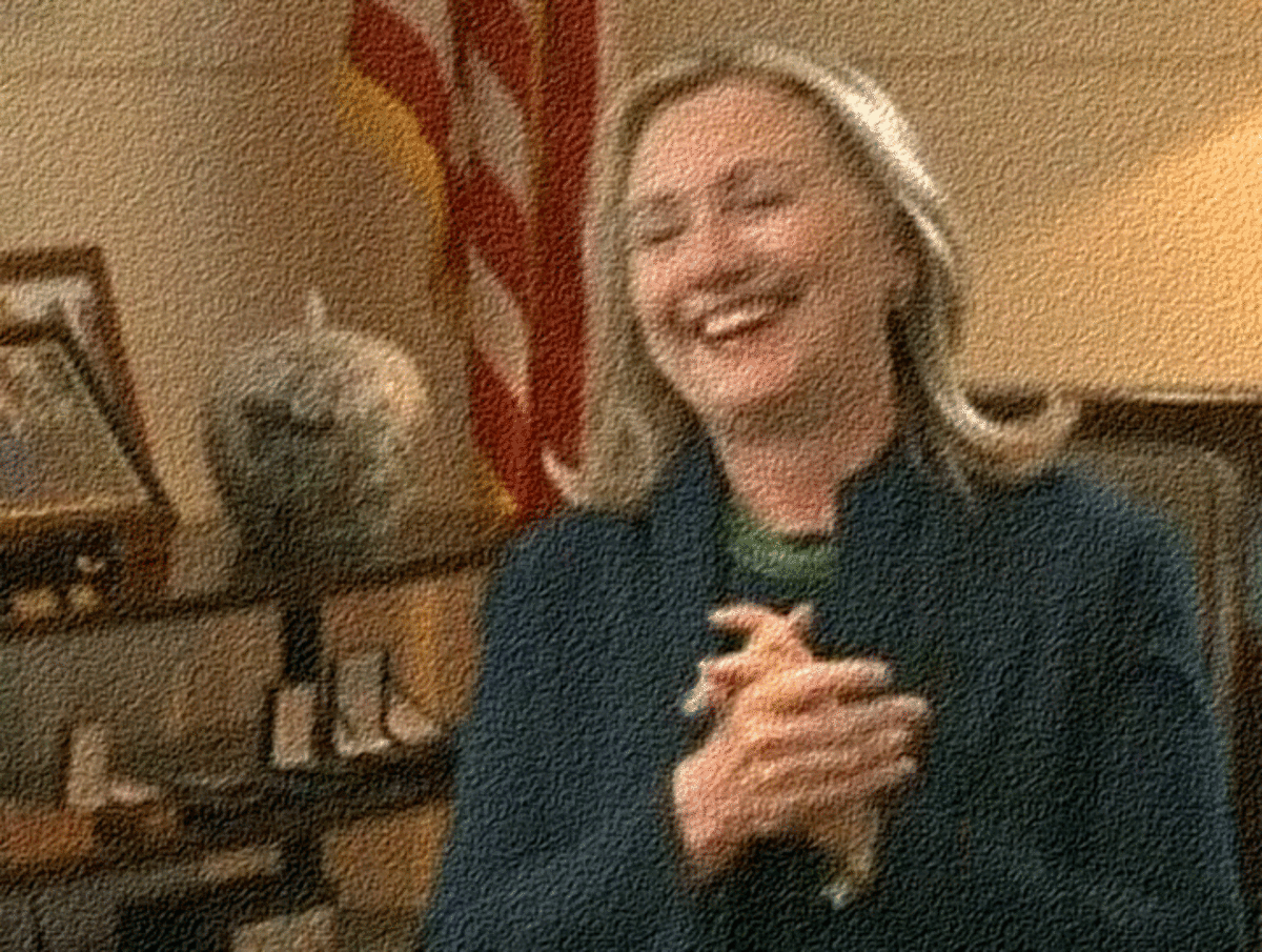 Hillary Laughing at Gaddafi