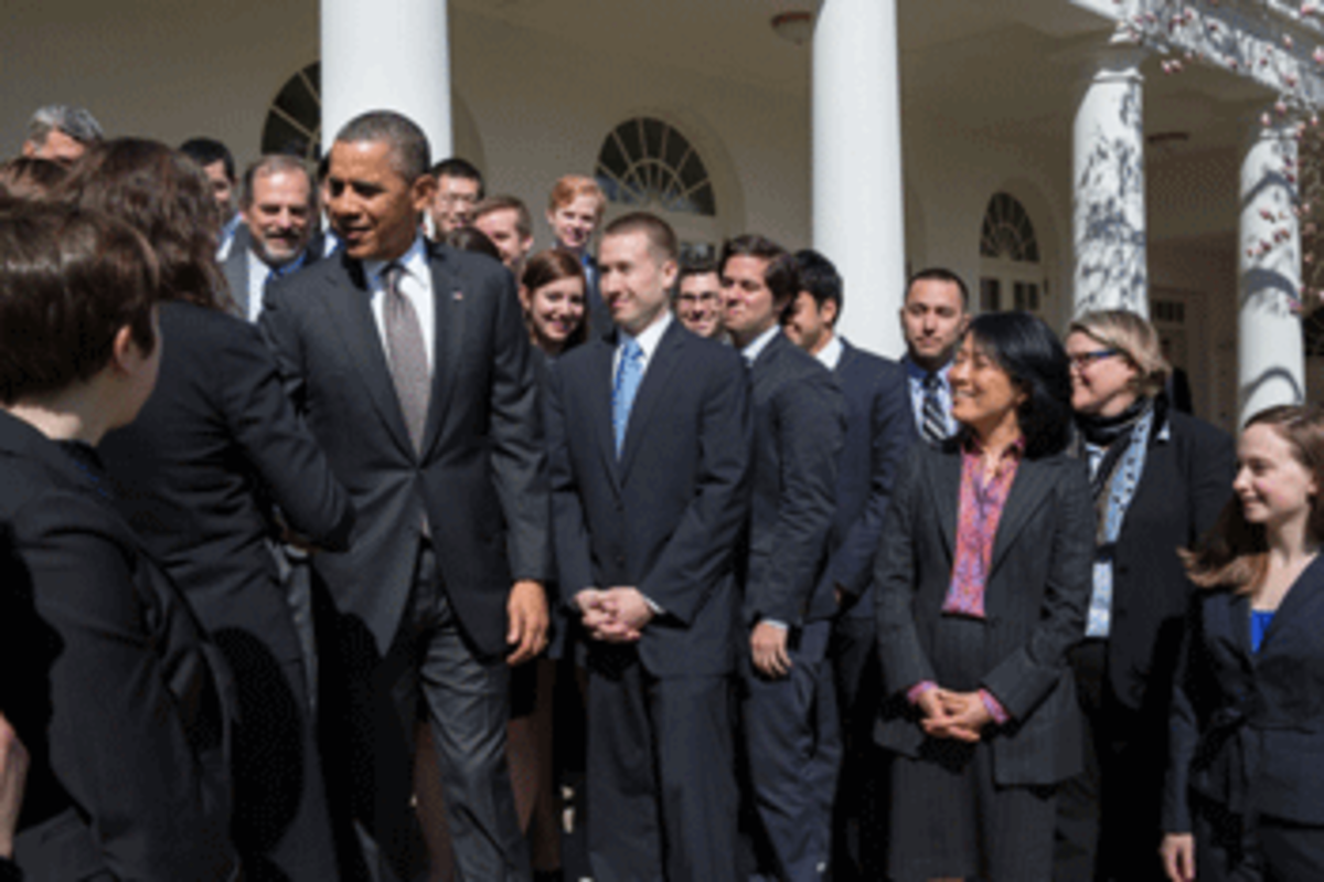 President Barack Obama greets staff of Council of Economic Advisers (Official White House Photo by Pete Souza)