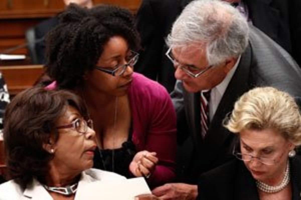 Rep. Barney Frank, chairman of the House Financial Services Committee, confers with Rep. Maxine Waters. (Win McNamee/Getty Images)