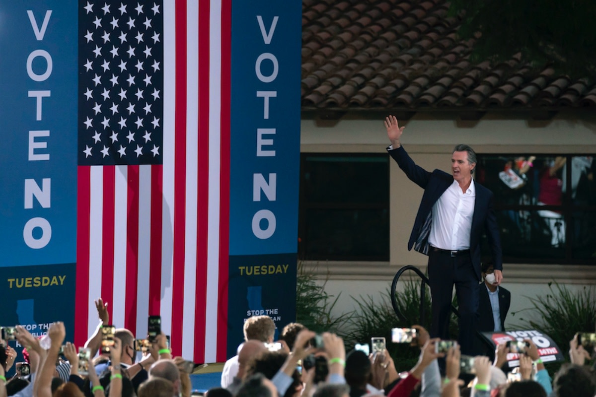 Supporters cheer California Gov. Gavin Newsom arrives at a rally ahead of the California gubernatorial recall election Monday, Sept. 13, 2021, in Long Beach, Calif. (AP Photo/Jae C. Hong)