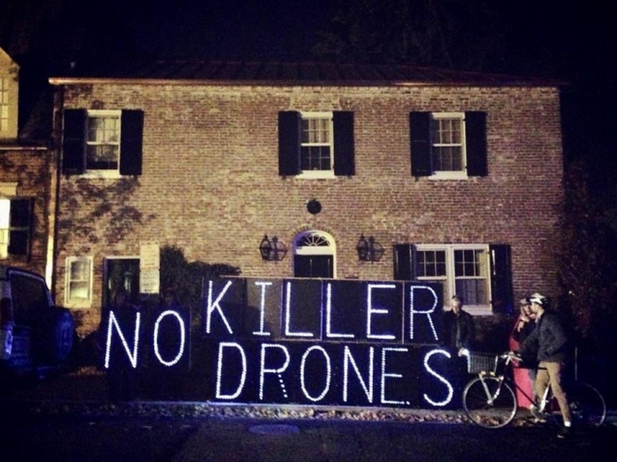 CODEPINK protests killer drones at DC home of Jeh Johnson (Photo: CODEPINK)