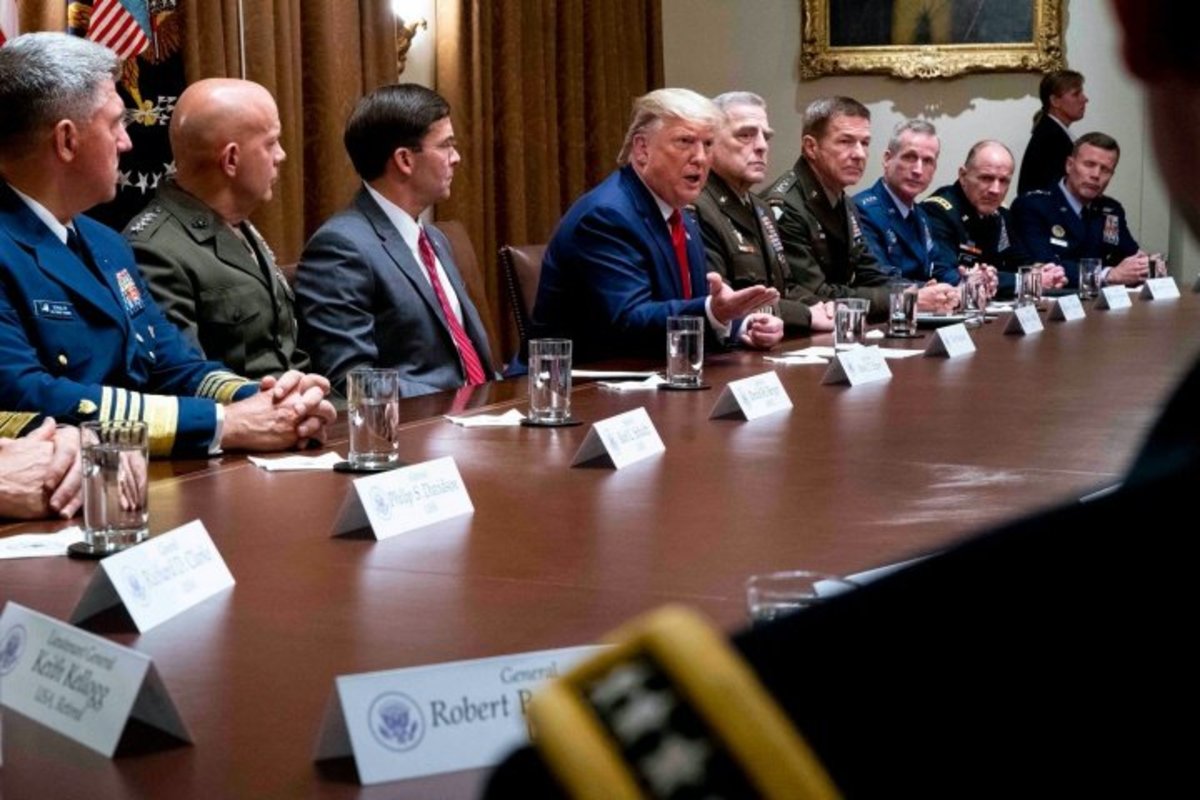 President Trump during a briefing with senior military leaders, including Gen. Mark A. Milley, right, chairman of the Joint Chiefs of Staff, at the White House last month.Credit...Doug Mills/The New York Times