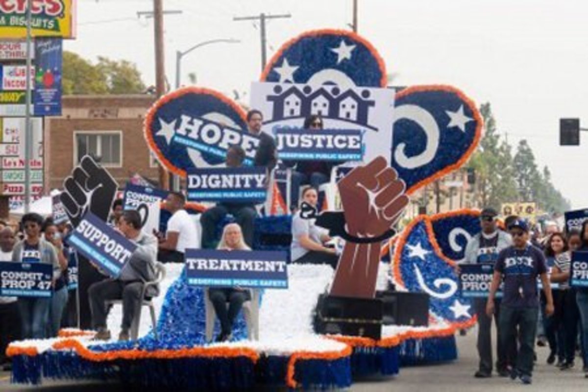 Members of Community Coalition raised awareness about the full funding for Proposition 47 during the annual Martin Luther King Jr. Day Parade in January in South L.A. Photo courtesy of Community Coalition.