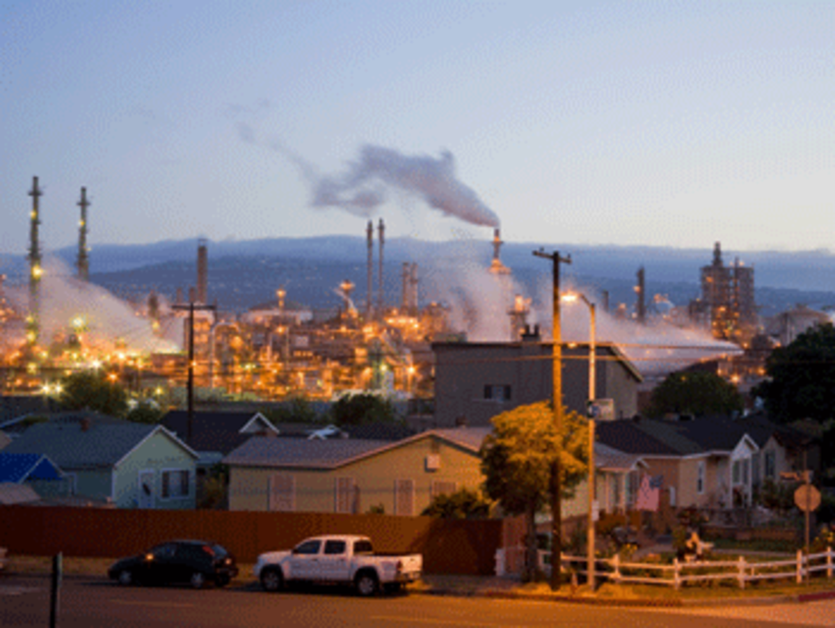 Residential housing next to oil refinery at Wilmington. Wilmington has one the highest risks of cancer due to it’s proximity to the Ports of Los Angeles and Long Beach, and the several oil refineries in the vicinity. Los Angeles, California, USA (Photo by Universal Images Group via Getty Images)