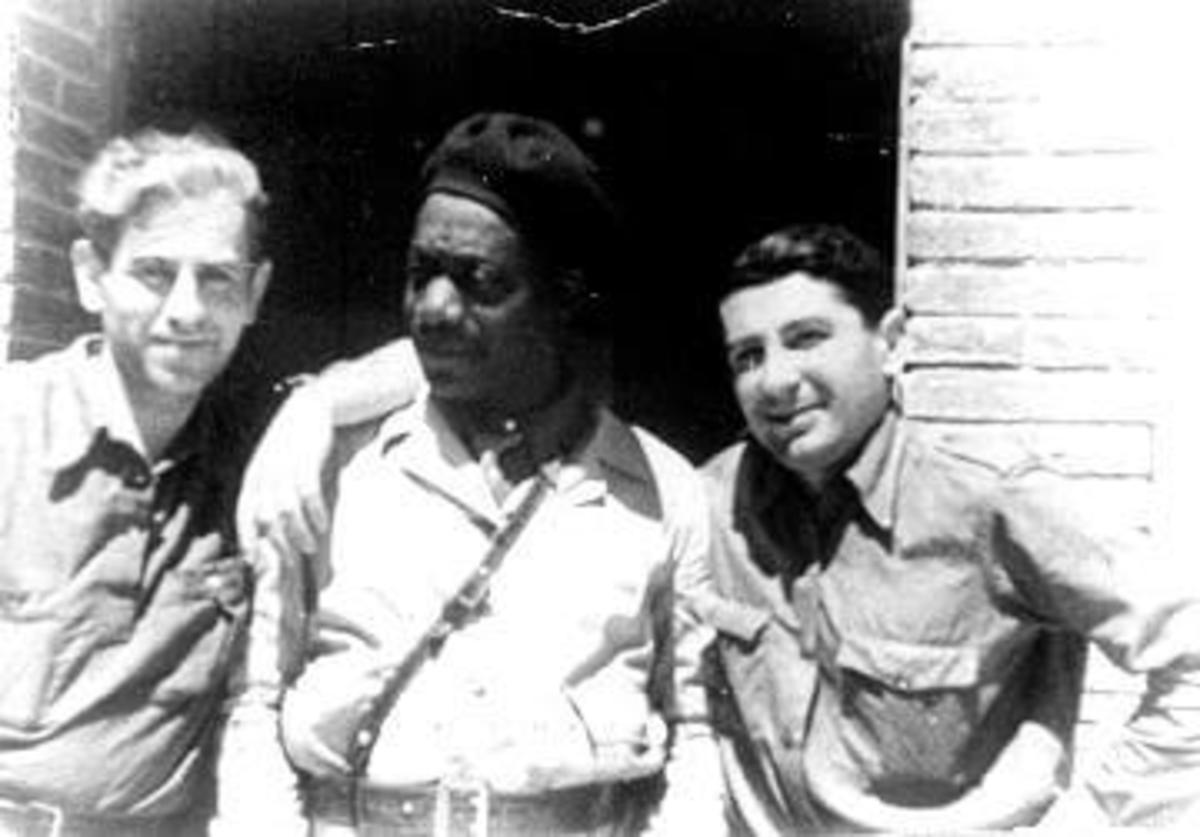 Haywood (center) serving in the Spanish Civil War.