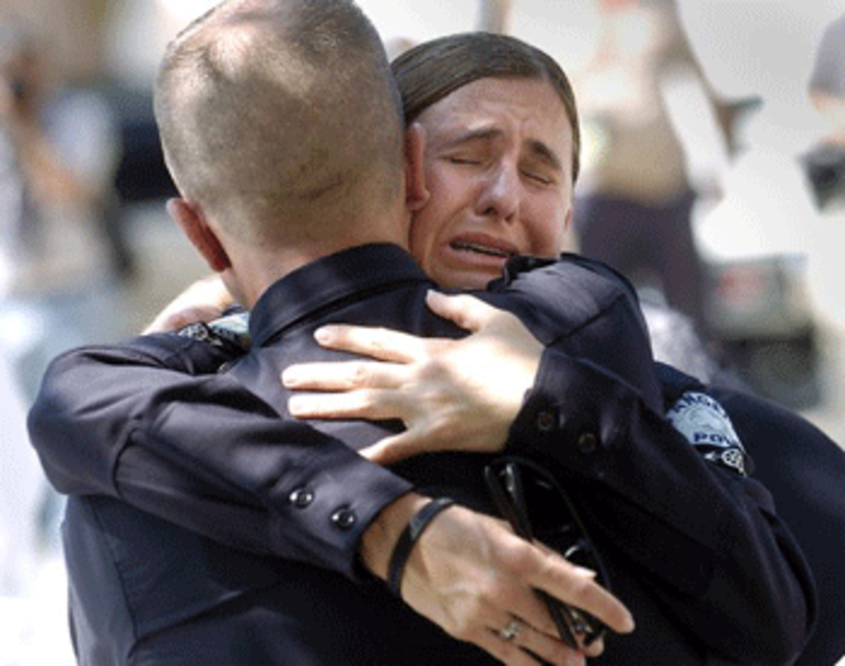 Laura Gerritsen, LAPD officer and life partner with LAPD Officer Spree DeSha who died in the Metrolink crash last week, cries after the funeral on Thursday, Sept. 18, 2008, at Cathedral of Our Lady of Angels. (Photo: Tina Burch)