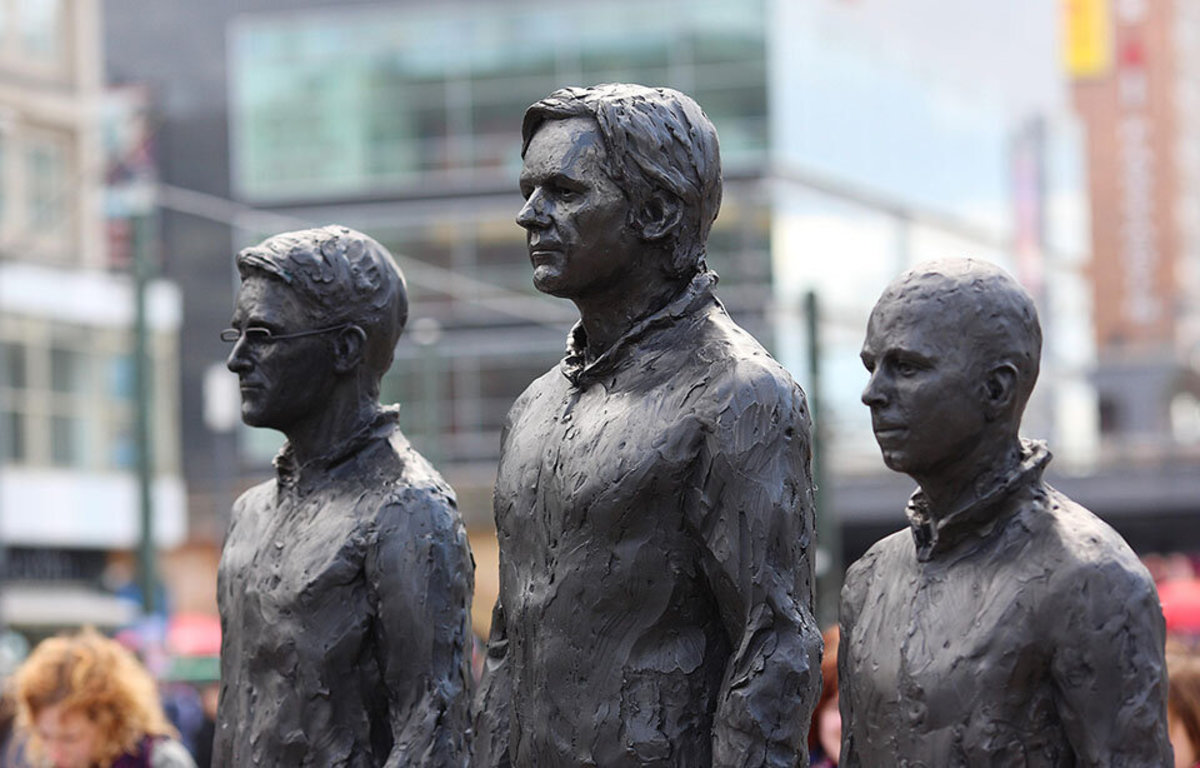 Edward Snowden, Julian Assange & Chelsea Manning statues by Italian sculptor David Dormino, Alexanderplatz - Berlin 2015.