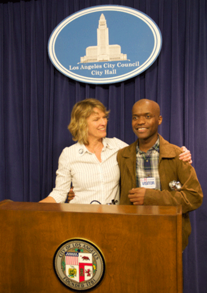 Move to Amend LA co-chairs Mary Beth Fielder and Daniel Lee savor their victory at the press conference afterwards.