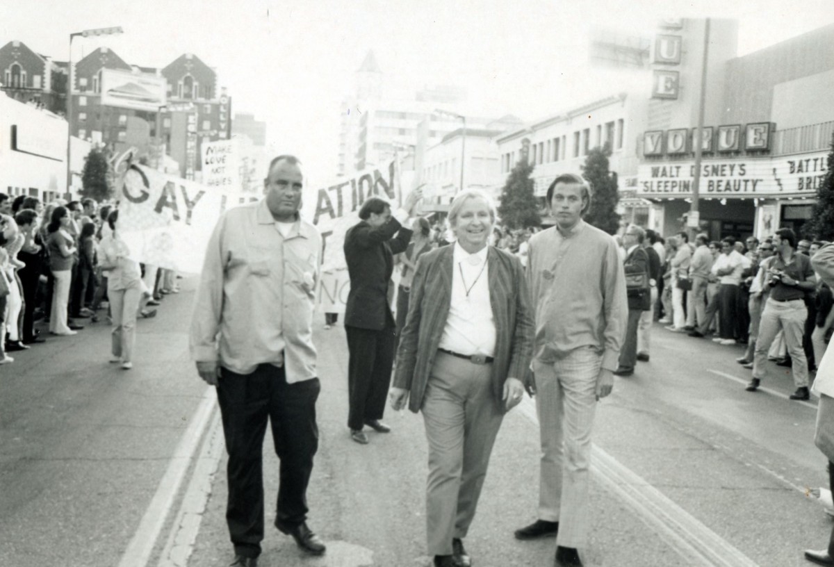 First Gay Pride parade (Christopher Street West Parade) on Hollywood Blvd. Parade co-founders (l) Bob Humphries and Morris Kight (Rev Troy Perry, not pictured, also co-founded). Unidentified man on the (r). (Photo: 1970. Brian Traynor, Australian Lesbian and Gay Archives.)