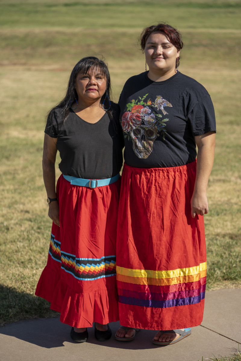 Desiray Emerton (left) and her daughter stand outside the Riverside Indian School. Nick Oxford for The Imprint