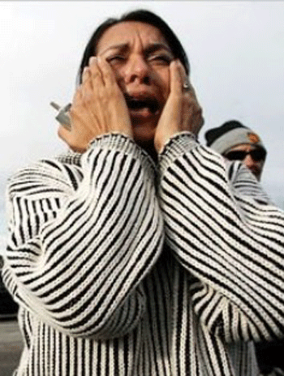 ICE-raids Marta Granillo cries for her husband, relatives and friends who were being arrested during an ICE raid. (AHMAD TERRY/ ROCKY MOUNTAIN NEWS)