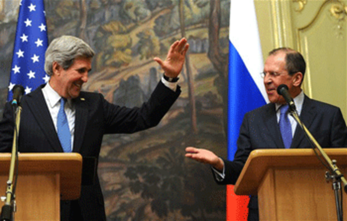 Secretary of State John Kerry celebrates the Iran deal with Russia’s Foreign Minister Sergei Lavrov Photo: Photoshot/Vostock Photo