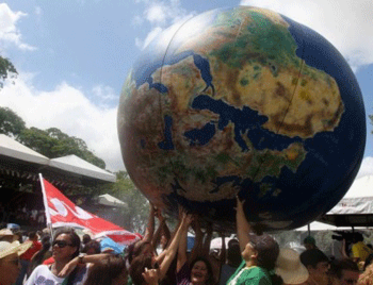 People transport a globe in a parade held during the World Social Forum in Belem, in Para, in the heart of the Brazilian Amazon, on January 28, 2009.