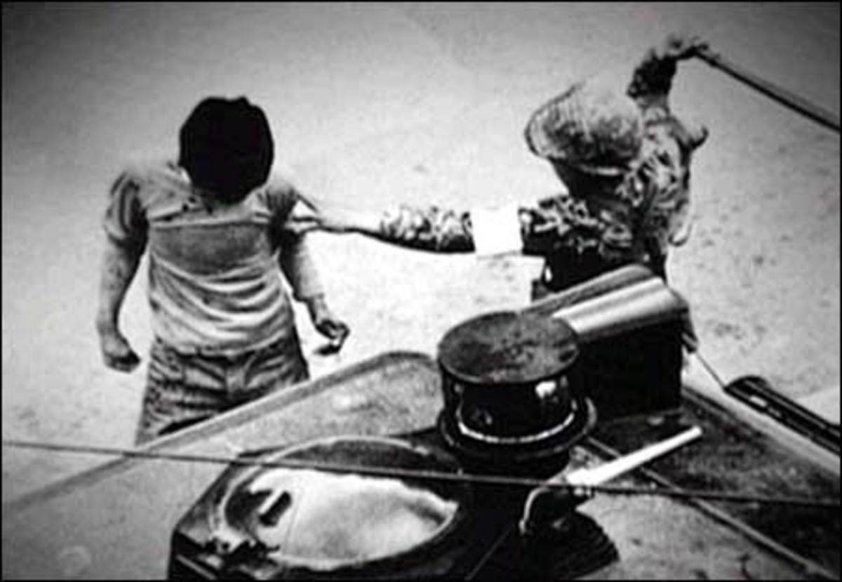 Korean protester captured by a South Korean soldier during the democratic uprising in Kwangju. May 1980.